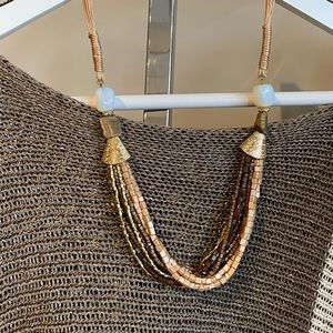 Brown, tan, and gold multi-strand necklace